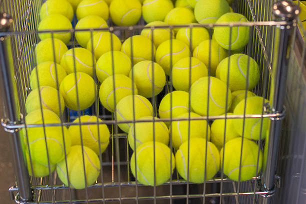 istock Tennis Balls in Practice Basket cart 465261429