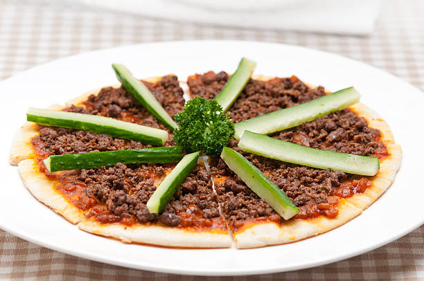 istock Turkish beef pizza with cucumber on top 465265343