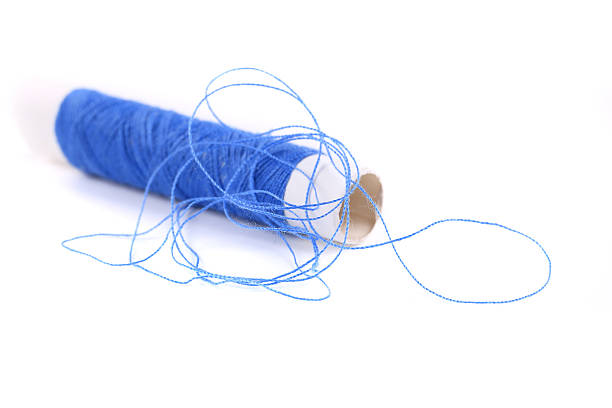 istock Blue coil of threads close up. 465266275