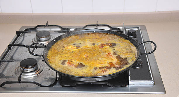 istock Cooking Paella on Stove Top 465267921