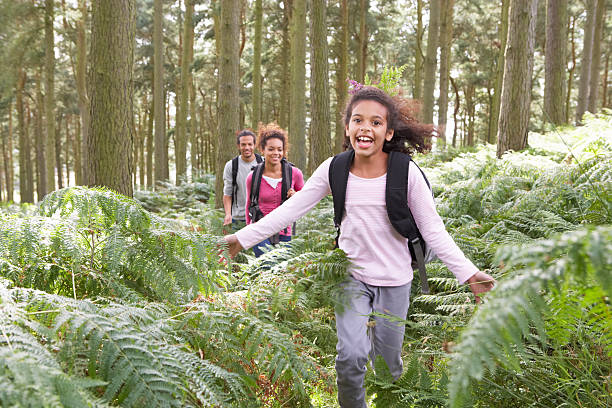 istock Family Group Hiking In Woods Together 465269059