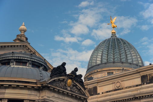 Called Dresden Art Academy, overlooking the main portal and the glass dome, also lemon squeezer stated