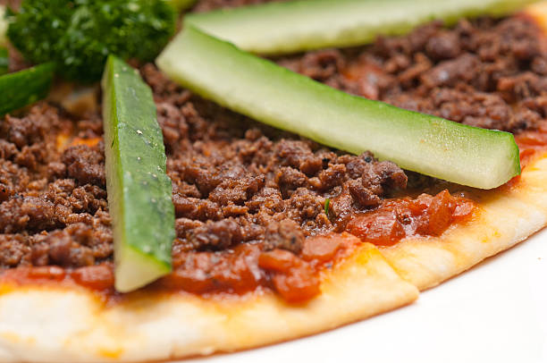 istock Turkish beef pizza with cucumber on top 465274805