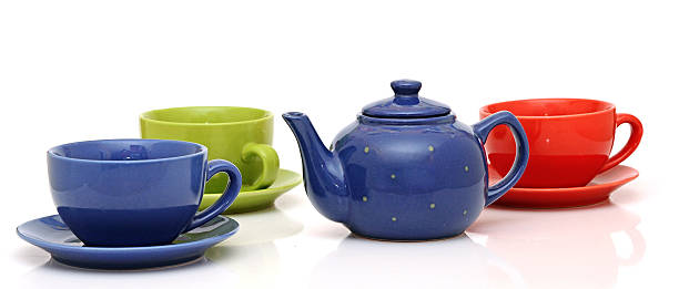 istock colorful tea cups with teapot isolated on white 465276135