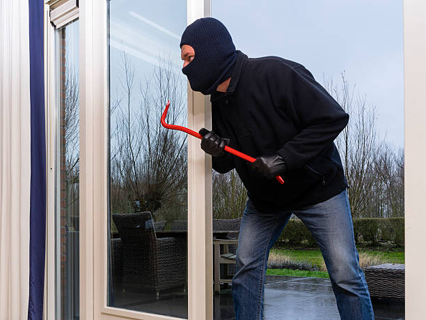 istock Burglar with a crowbar 465279097
