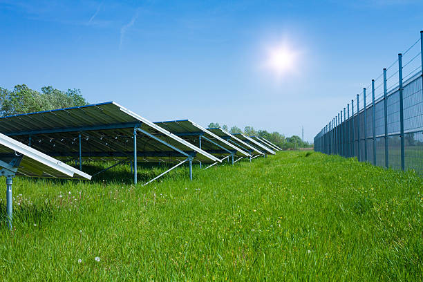 istock solar energy panels against sunny sky 465281869