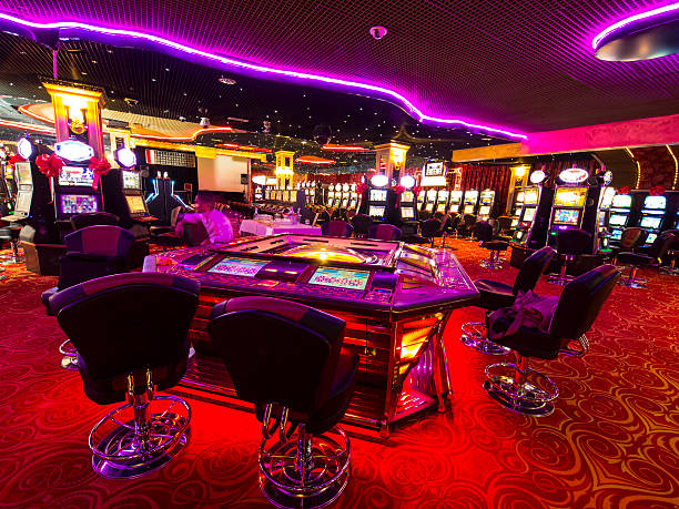 Casino at wait A Slot machines room in an empty  Casino. casino photos stock pictures, royalty-free photos & images