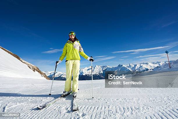 Happy Woman In Mask Skiing On Skitrack Slone Stock Photo - Download Image Now - 2015, Activity, Adult