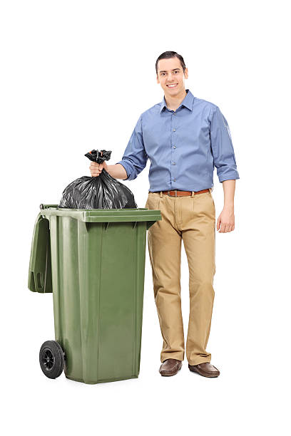 istock Full length portrait of a man throwing out garbage 465285916