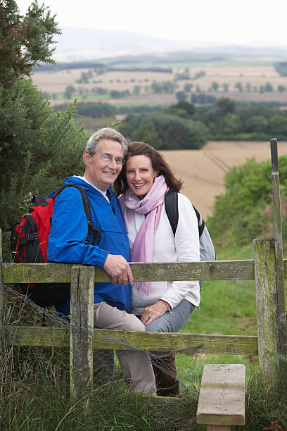 istock Senior Couple On Country Walk 465286339