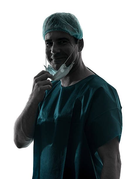 istock doctor surgeon man portrait with face mask smiling friendly silh 465286536