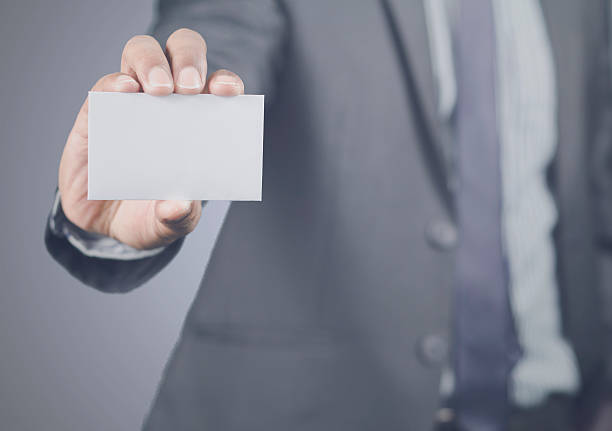 istock Businessman showing his ID card 465293230