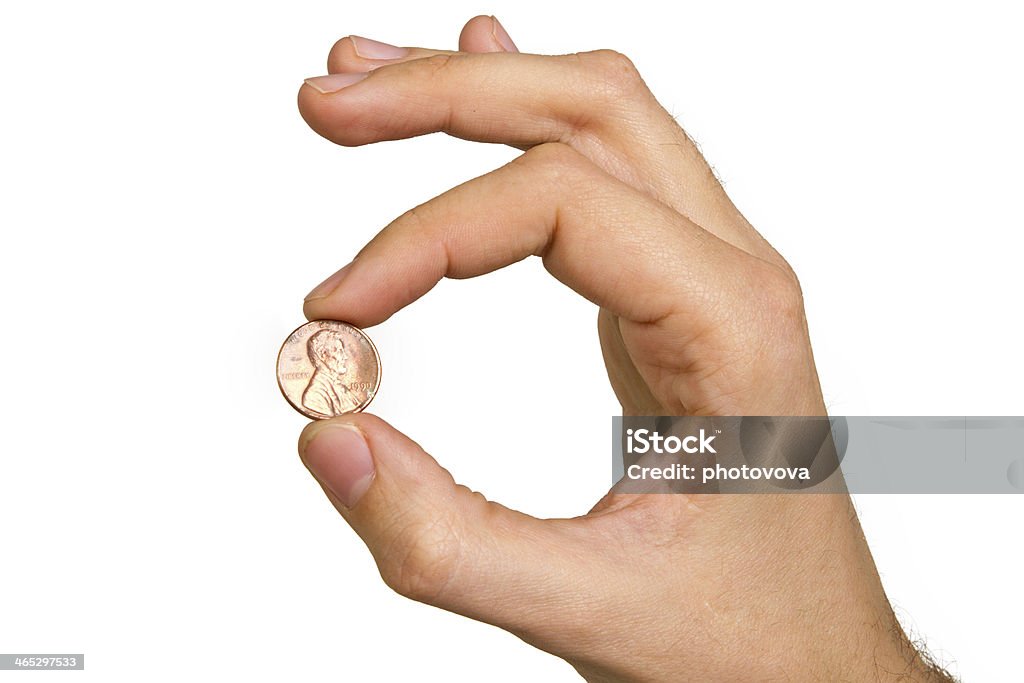 man's hand holding coin man's hand holding coin isolated on white background Adult Stock Photo