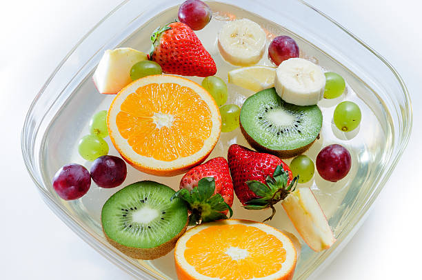 istock juicy fruits in a plate with ice 465301910