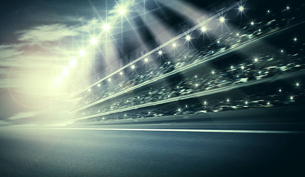 istock Artistic track arena with bright lights shining 465310752