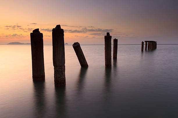 istock Old pier in the sunrise 465315363