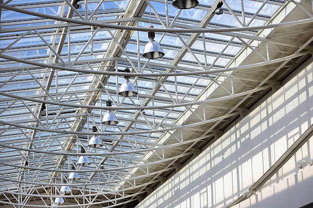 istock Glass roof with blue sky background 465317501