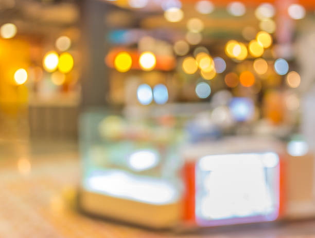 istock blurred image of shopping mall and restaurant. 465318510