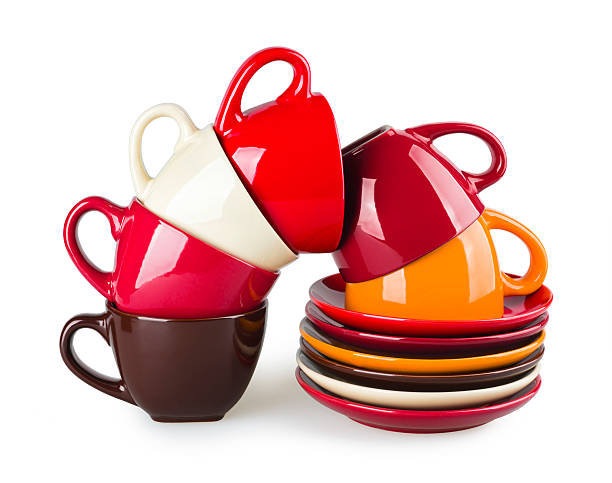 istock Stack of colorful mugs and saucers on white background 465318790
