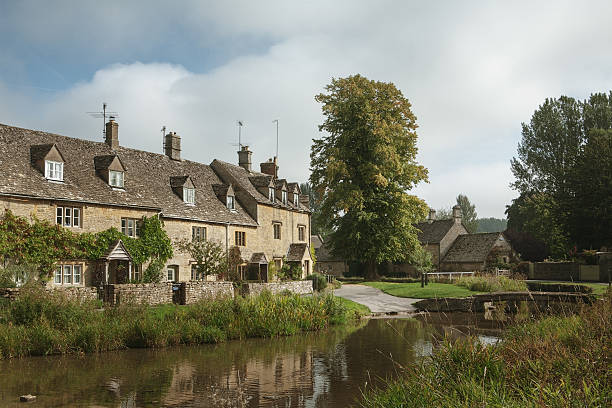 istock Stone houses in Lower Slaughter, Cotswolds, England 465319353