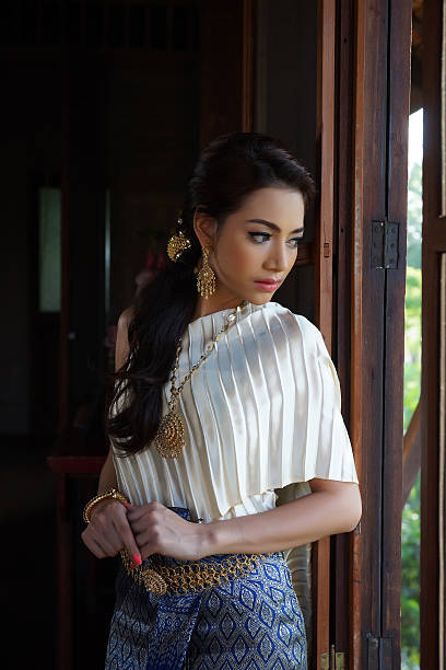 istock Thai woman wearing typical dress 465324229