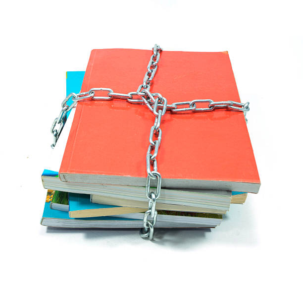 istock pile of books with a chain 465324783