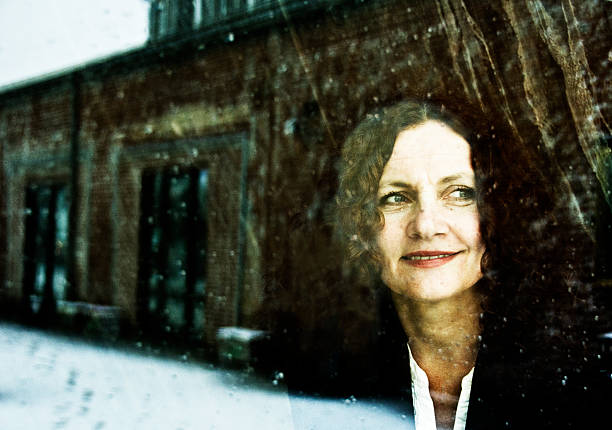 istock Woman in the Window 465327371