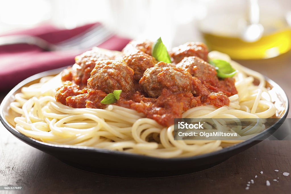 spaghetti with meatballs in tomato sauce Basil Stock Photo