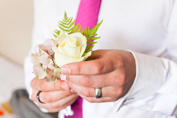 istock Pinning a Boutonniere 465327815