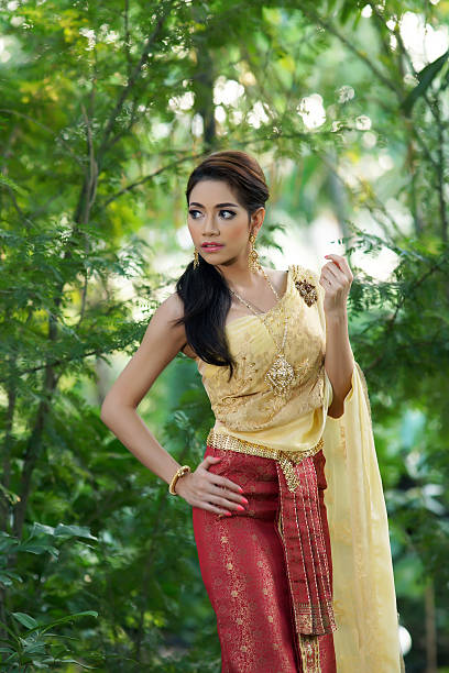 istock Thai woman wearing typical dress 465332887