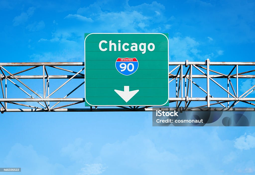 Chicago Interstate 90 Sign An elevated overhead highway sign. It reads "Chicago" and has an Interstate 90 shield above an arrow pointing downward. Chicago - Illinois Stock Photo