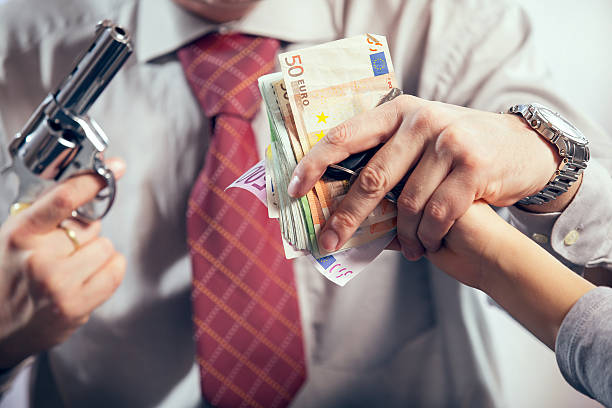 istock Man With Gun, Money, 465335570