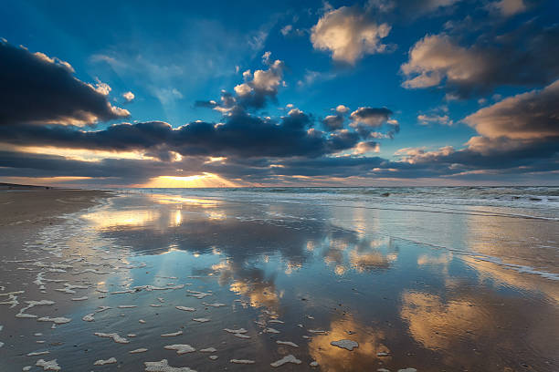 istock beautiful sunset over North sea coast 465336180
