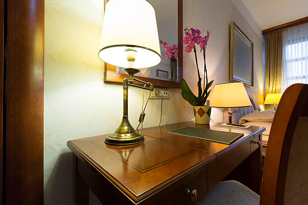 istock Hotel room interior - desk and lamp 465339290