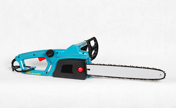 istock Green Electric Chainsaw Isolated On White Background 465339490