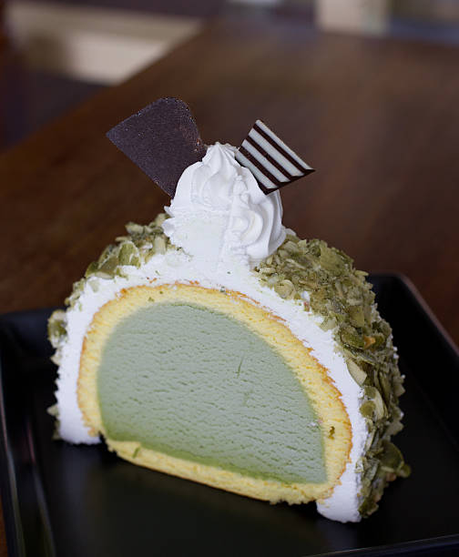 istock Greentea icecream cake on wood table 465341843