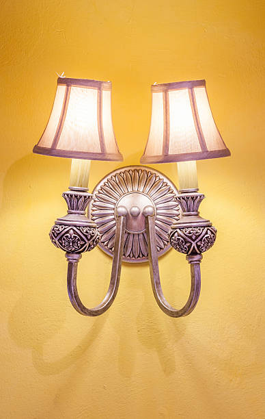 istock Vintage wall lamp on the yellow wall 465345114