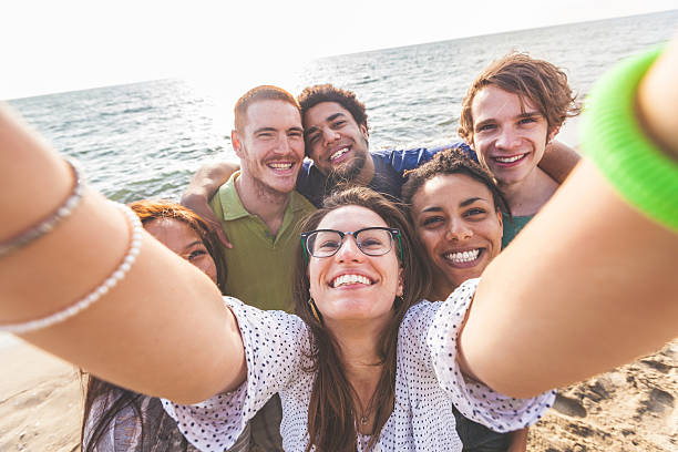 istock Multiracial Group of Friends Taking Selfie at Beach 465347686