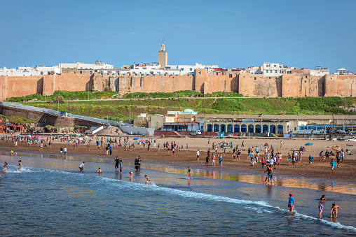 Moroccan women and children having fun on a sunny day at the Kasbah des Oudaias beach in the city of Rabat, Africa.Nikon D3x