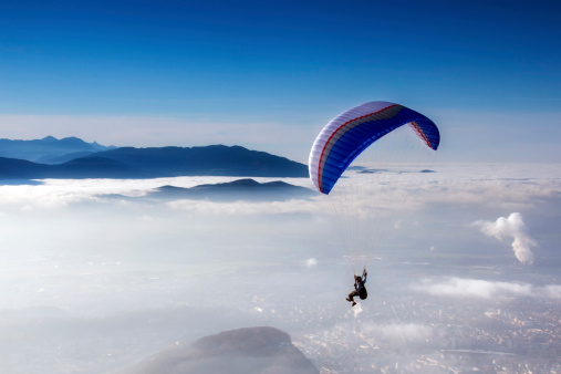 skydiving - skydiver in blue sky