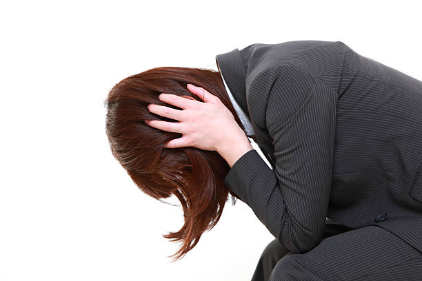 istock depressed businesswoman 465352052