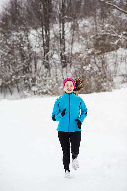 istock Winter running woman 465353793