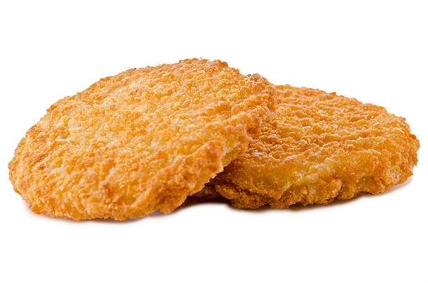 Chicken nuggets Chicken nuggets, isolated on white background. Close up. breaded photos stock pictures, royalty-free photos & images