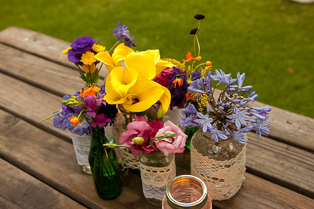 istock flowers in wood background 465355116