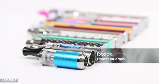 Electronic Cigarettes Stock Photo - Download Image Now - Addiction, Battery, Blue