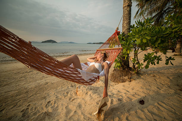 istock Woman on hammock-Tropical beach 465355800