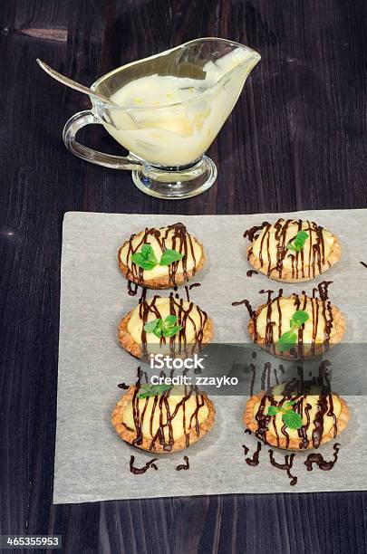 Tartlets With French Cream And Mint Stock Photo - Download Image Now - Activity, Backgrounds, Baked