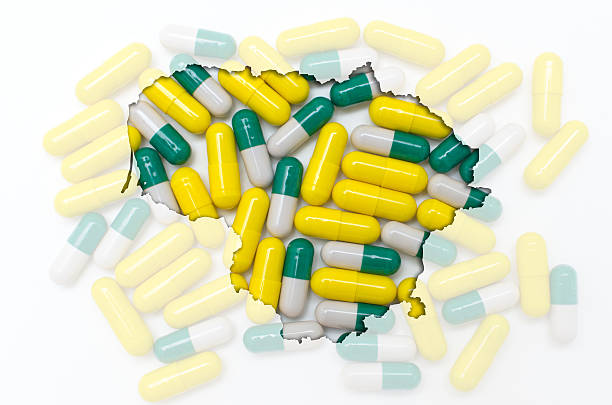 istock Outline map of lithuania with pills 465356956