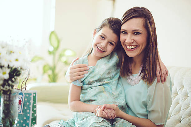 istock Happy mother posing with her daughter 465357504