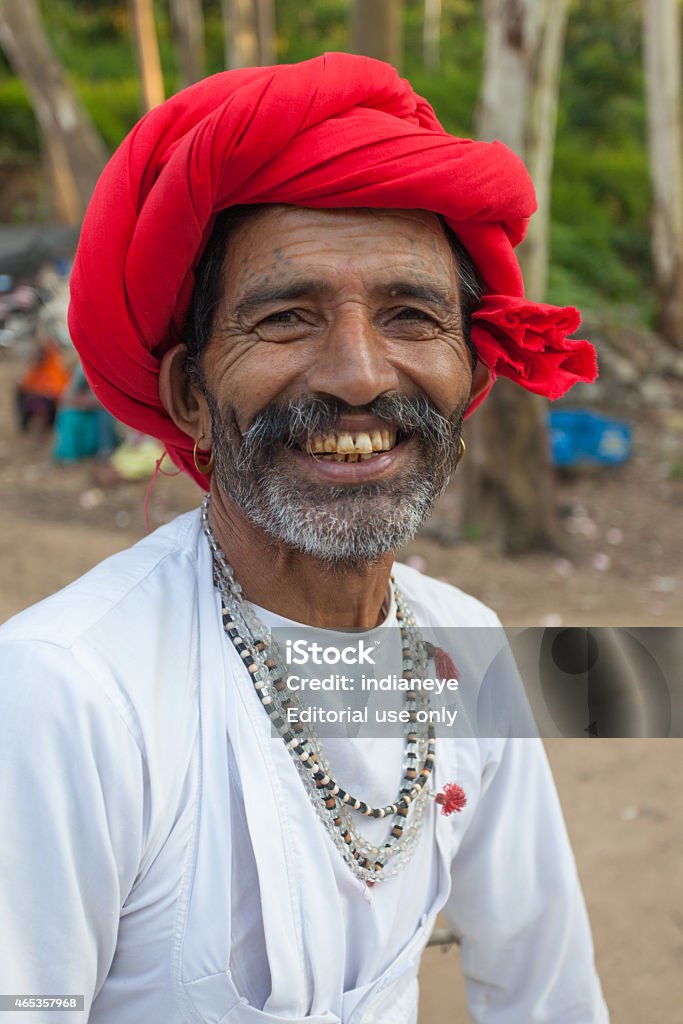 Rajashthani People Portrait Mount Abu, Indore - October 1, 2014: Portrait of a trolly driver in traditional Rajashani cloths at sunset point. 2015 Stock Photo